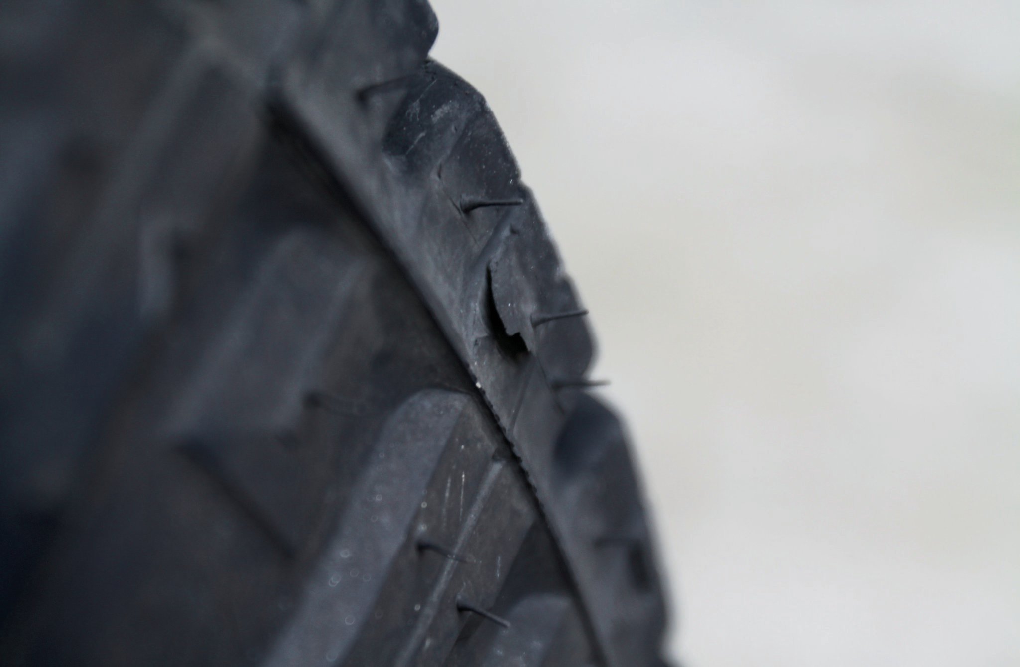 We did manage to get some minor damage to the sidewall and shoulders, but we just ran these like we didn’t care. We were confident we wouldn’t pop them. The two minor slices are from sliding off a rock with most of the weight of the Jeep on that tire, and the shoulder chunk is from holeshotting it out of the end of a rock field to catch up to the pack. That big V-8 does some epic holeshots. You should have seen what we kicked up.