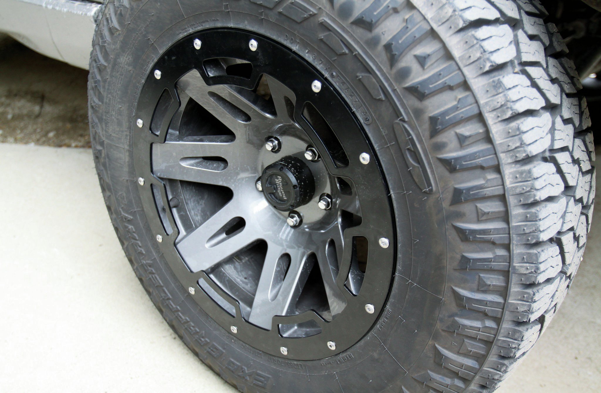 We mounted the Exos on a set of 17x9 Rugged Ridge XHD wheels. Backspacing is 4.53 inches. We liked the way the Gunmetal hue worked with the silver paint on the Grand, but as you can see with this setup, the tires didn’t provide much protection for the edge of the wheel, so we added these trim rings from Rugged Ridge so that when (not if) we end up beating these tires in the rocks, the wheels have some protection.