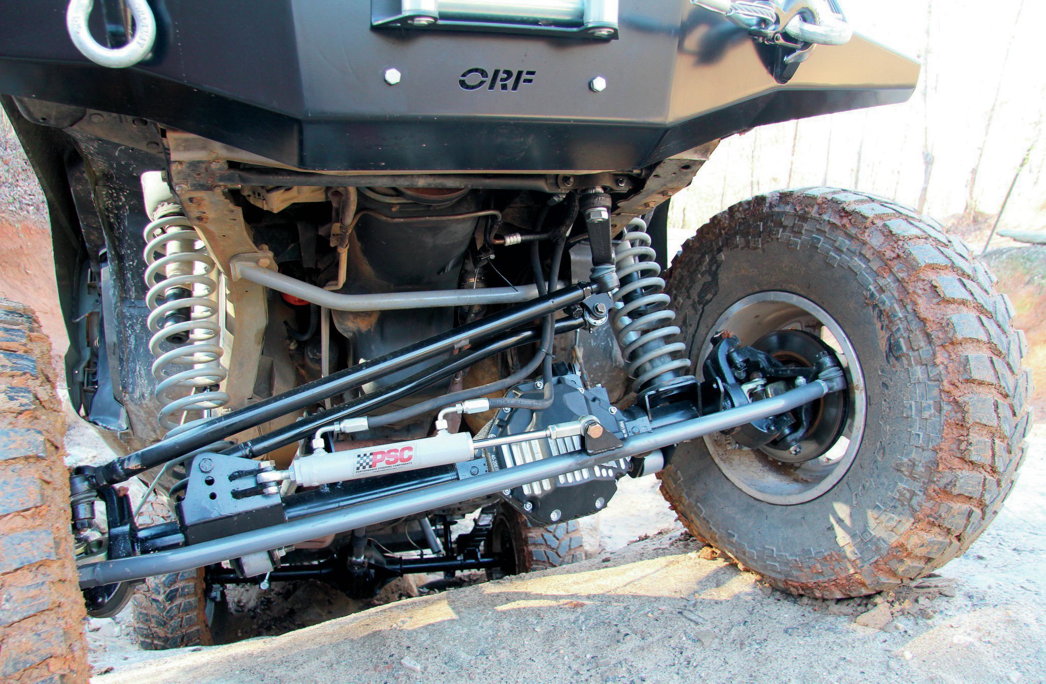 Gulches trails are short but packed with back-to-back obstacles. This meant we would keep our ARB Air Lockers engaged the majority of the time. The PSC Motorsports hydraulic-assist steering system paid for itself and then some by allowing us to effortlessly navigate with the front diff locked. We managed to smack the Synergy JK tie rod a few times as well but never bent the heavy-duty chromoly steering bar.