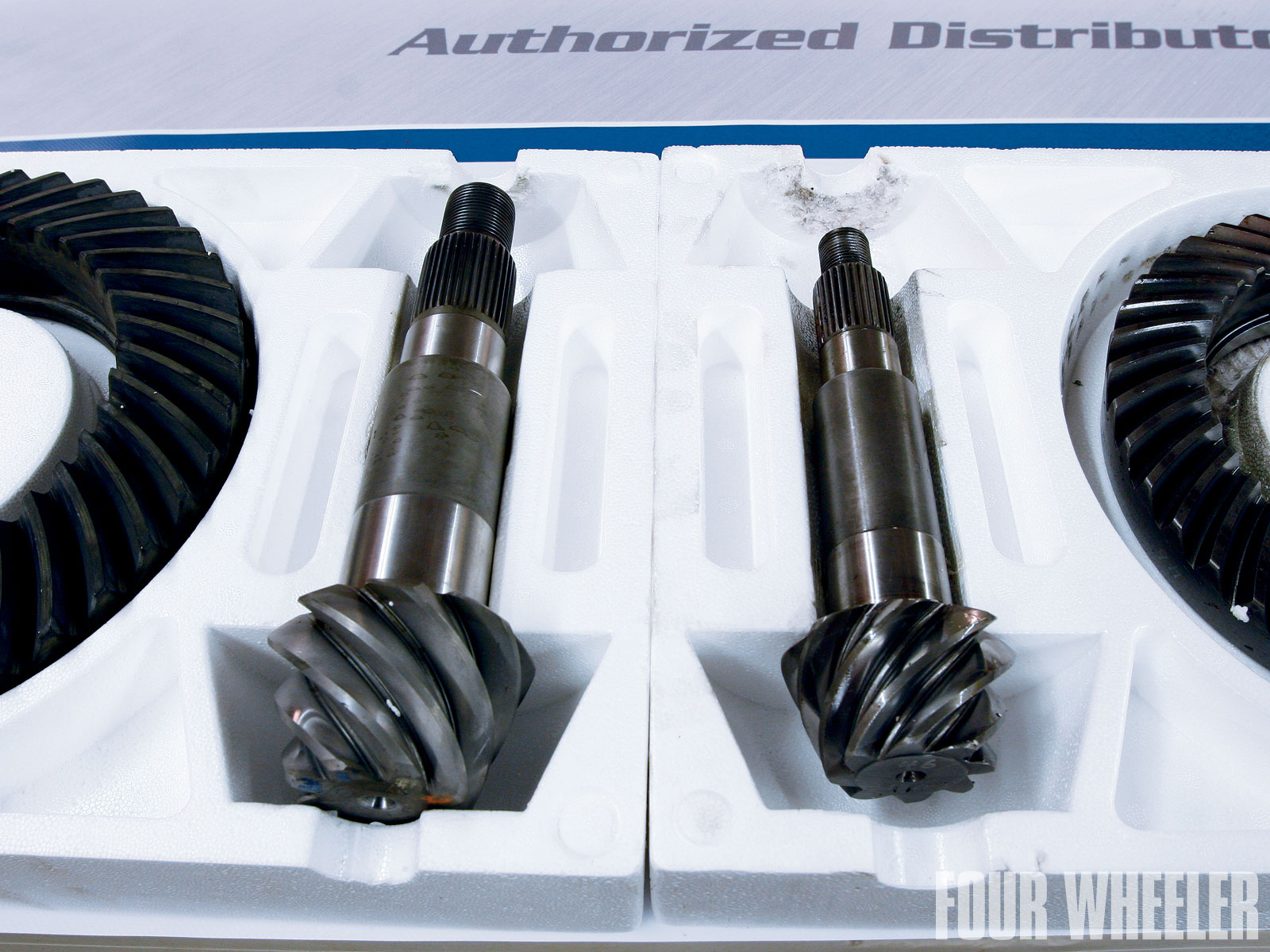 To give you an idea of how stout Dana 80 components are, we placed a Dana 80 pinion shaft and ring gear (left) next to a pinion shaft and ring gear from a Dana 60. The Dana 80 pinion gear is 2 inches in diameter at its largest and 1.625 inches in diameter at its smallest and has 37 splines. The Dana 60 pinion gear is 1.625 inches in diameter at its largest and 1.250 inches in diameter at its smallest and has 29 splines (early Dana 60 pinion shafts had 10 coarse splines).