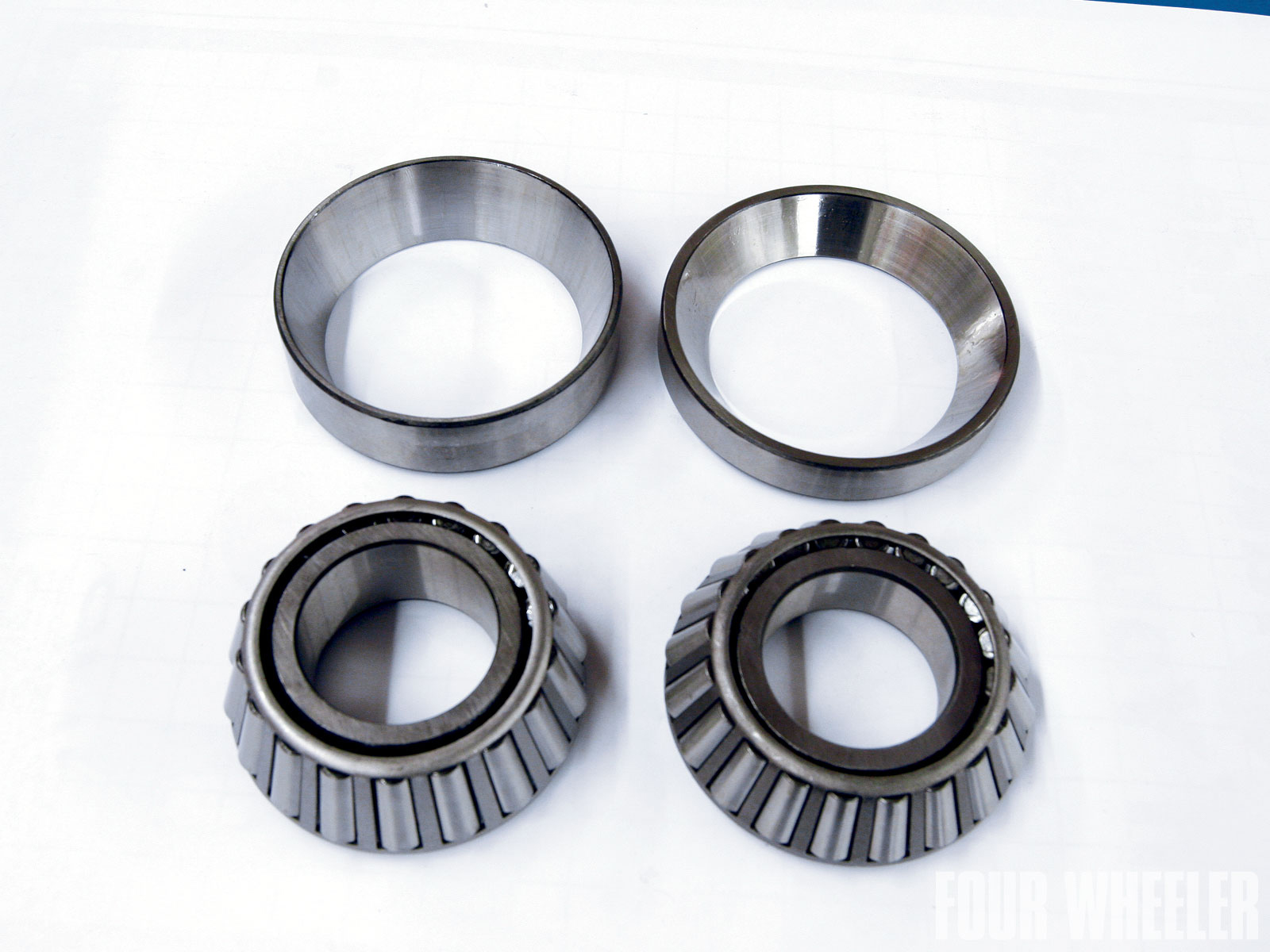Dana 80 axles through 1998 used the larger pinion bearing on the left. After '98, the vast majority of Ford applications switched to the smaller pinion bearing shown on the right. Custom Diff notes that obviously the larger pinion bearing models are the most desirable because they spread the load over a larger surface area.