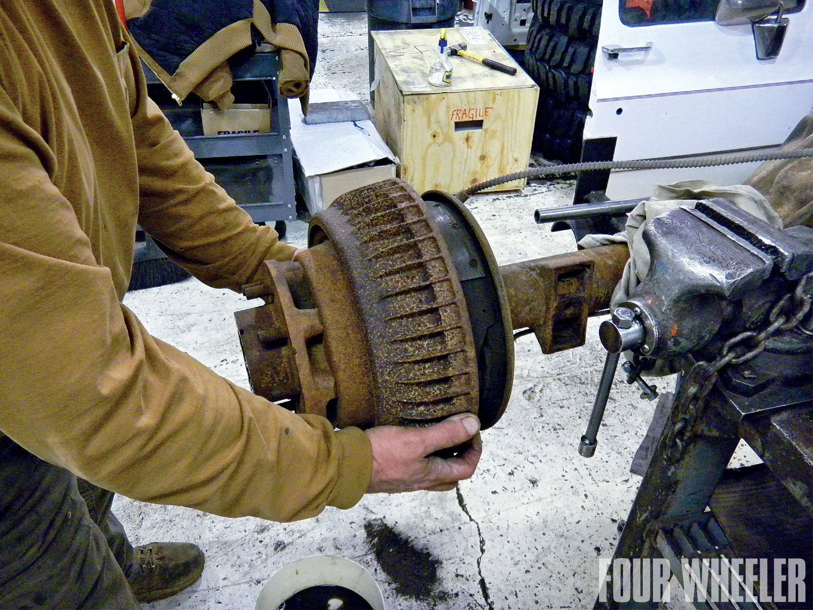 Next, the wheel bearings and adjusting nuts must be removed to free up of the wheel hub and drum assembly from the axlehousing.