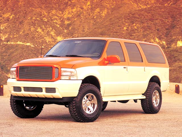 The Excursion's front end was customized with a variety of Car Wear gear, including a polished billet grille, ultra-white headlights, and clear corner lenses.