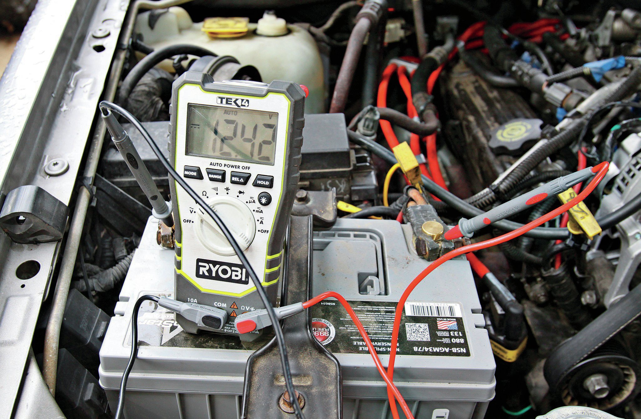 So, when the information center told him check battery, he took his multimeter out of his back pocket and checked it on the side of the road. The voltage read 11.7 V with the engine running. It should read in the mid 14s ideally with the engine on and in the mid 12s with the engine off. Something was wrong in here. It turned out that the alternator was dead. Grand Cherokees are notorious for killing alternators, but this time it was Trasborg’s fault, not the Jeep’s.