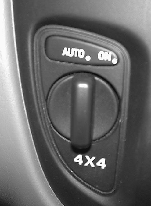 Ford’s Control Trac II four-wheel-drive system in the Escape is operated by a switch on the instrument panel. In “auto” mode, engine power flows to the front wheels, and when the front wheels start to slip or spin, progressive amounts of torque are instantly redirected from the front to the rear until traction is regained. This allows the Escape to be a light off-roader. We’ve seen it hold up well in washouts and on minor sand hills. The “on” mode is comparable to the 4-Hi of a two-speed transfer case.