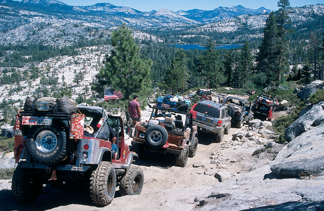 The goin' is slow over much of the Rubicon trail, and that's just fine with most participants, because the scenery is very beautiful. That's Buck Island Lake in the distance, and beyond it, some of the peaks of the Range of Light.
