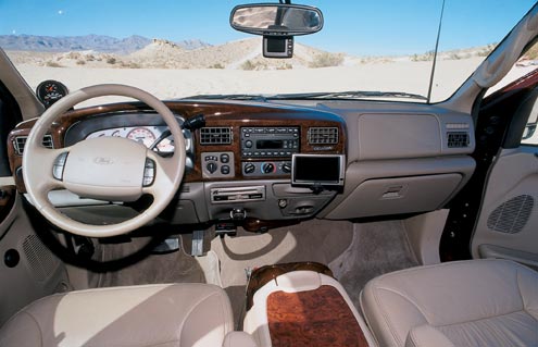 Inside the Excursion, the stock factory gauges were replaced by APC white-face gauges, and Hypermax turbo and pyrometer gauges were added to monitor critical engine functions. The stereo system was upgraded with Bazooka amplifiers and speakers, and passengers can watch either VHS videotapes or DVDs on either of two monitors.