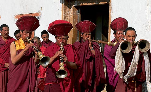 Buddhist monks at a ceremony in Karzok give us quite a welcome with an array of musical instruments.
