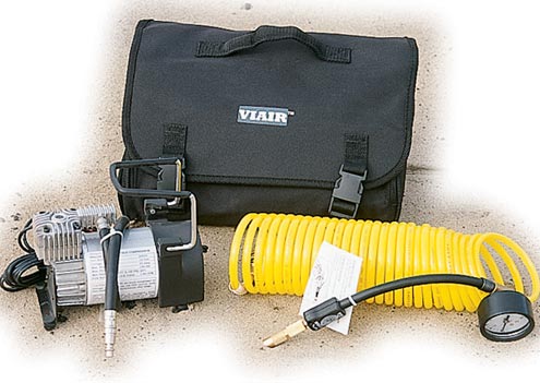 <p>Free Accessories (almost) <br>The EZ-Air is a little unit at a little price. At $179 (hard-mount) and $199 (portable), the E-Z Air is another good choice for those on a tight budget. This compressor has the most economical accessory package of the lot and for just $20 more you get a 25-foot nylon coil hose with clip-on air chuck and integral pressure gauge, battery-clip-end power cable, and an on/off switch, all in a nylon case. An added feature is the deflation-locking mode, which allows for rapid hands-free air down.