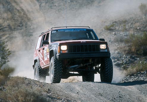 From a distance the JeepSpeed Cherokees don’t look much different than your average off-roader. Some competitors have been known to drive their rigs to the race, race ’em, and then drive them home afterward.