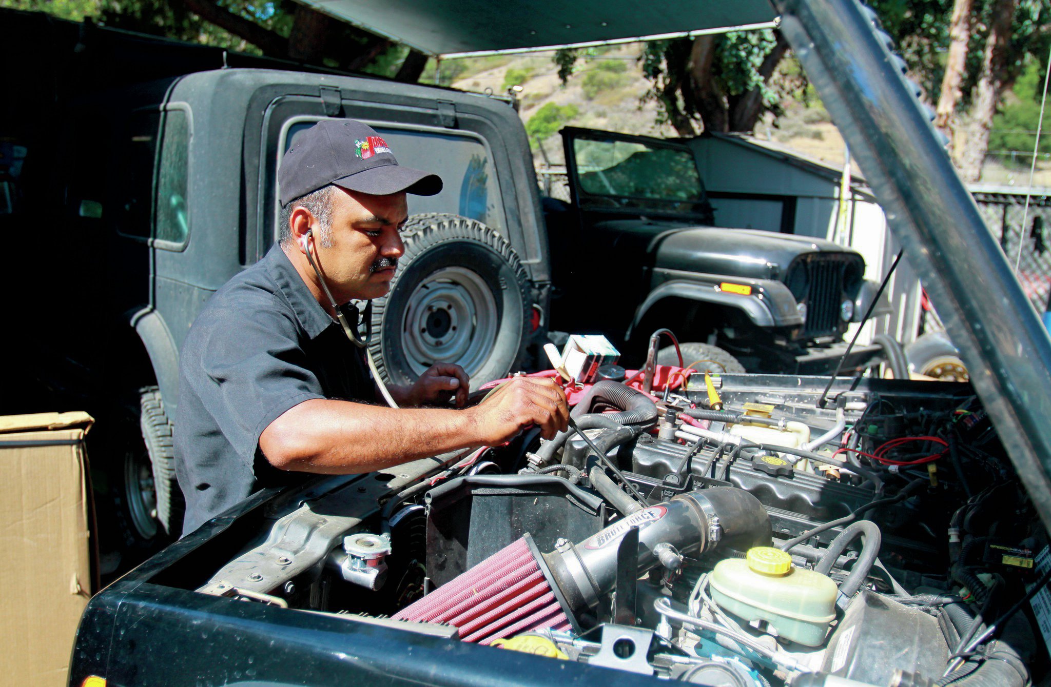 Since we’d replaced all the sensors with those from a running Jeep, plus a couple of new ones from Rock Auto because the other Jeep had different plugs, we tried cranking it. The tech heard something, but Trasborg, being deaf, of course didn’t. So, out came the stethoscope to try to isolate the noise. While we never did find the noise, that old rotor sure was hitting that cap hard, and that might have been what it was.