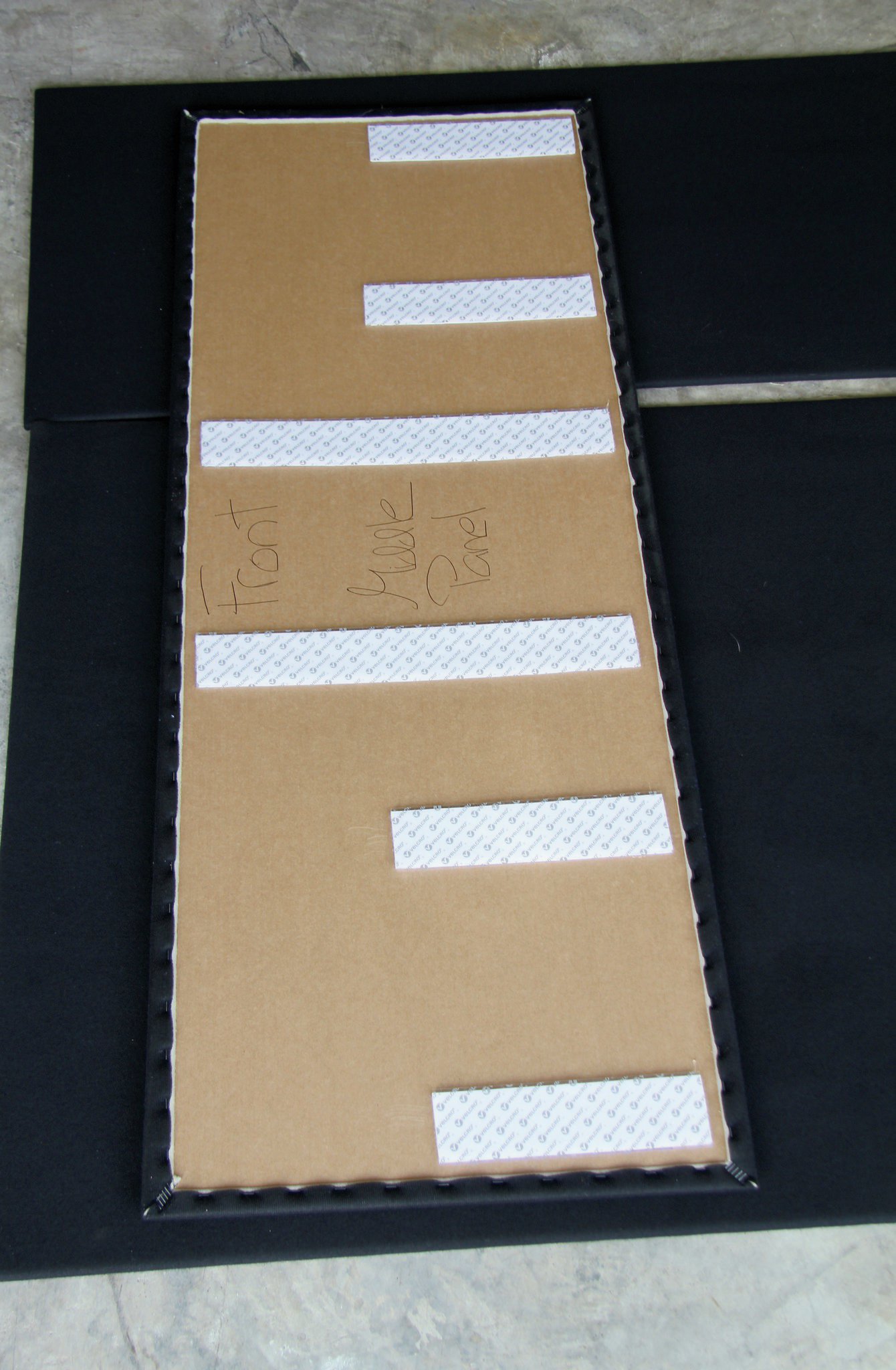 Each panel is clearly marked and fit with Velcro-brand strips with adhesive backing. Using staples to secure the fabric cover over the foam and particleboard base, the panels were extremely light but not flimsy in the least.