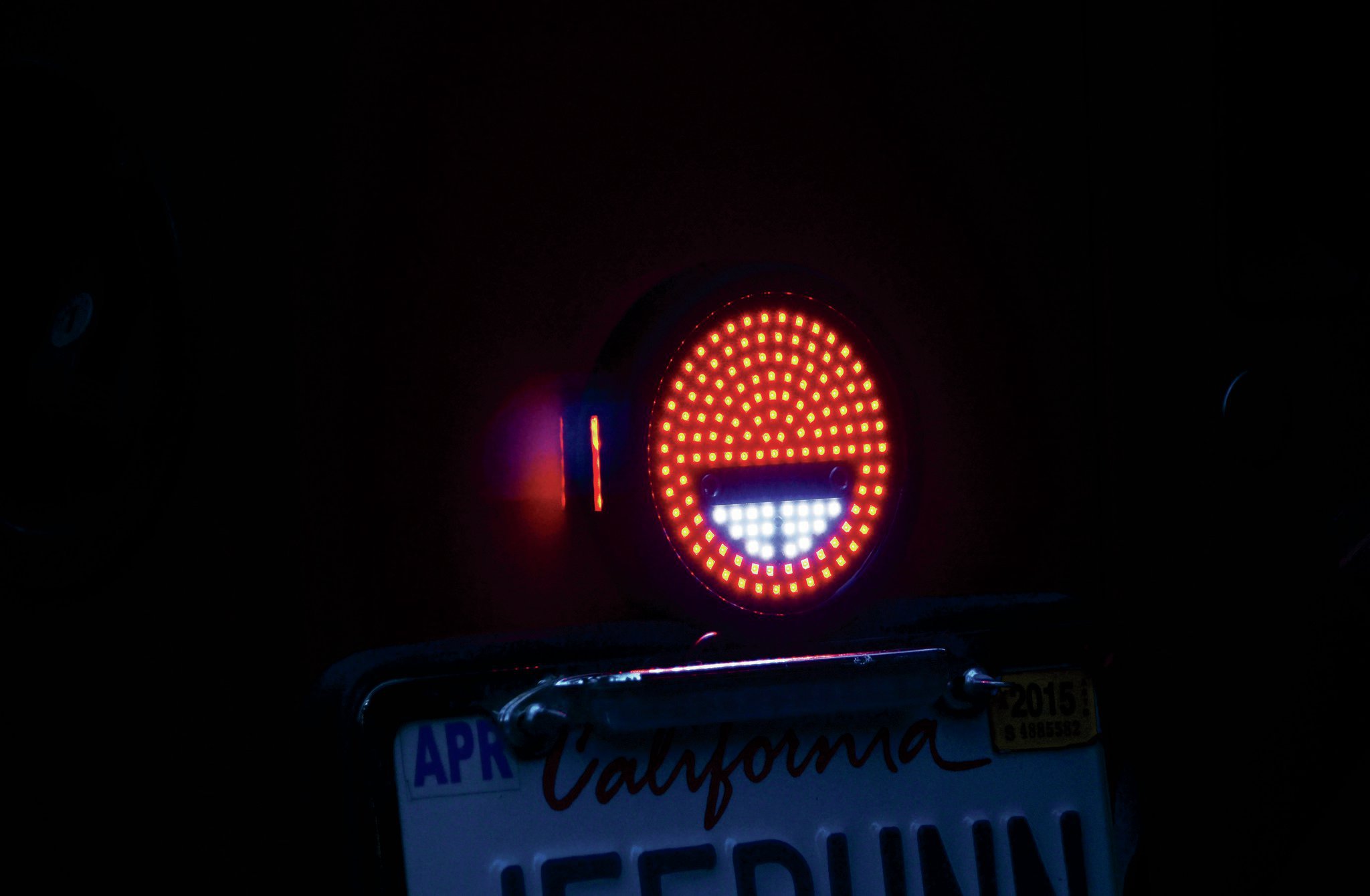 Here is what they look like with the parking lights and reverse lights on. The picture I tried to take with the brake lights on just didn’t work. They were too bright and all you could see was a ball of red. The lights have been installed for six months now, and all LEDs are still lit up so I’m thinking maybe Max-Bilt’s claim was true. Check Jp’s Facebook page in another six months, and I’ll let ya know how they are doing.
